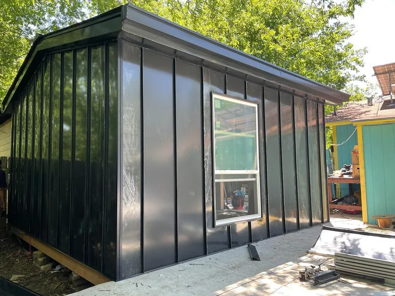 Black standing seam metal wall panels for Metal Roof Installation in Gloversville