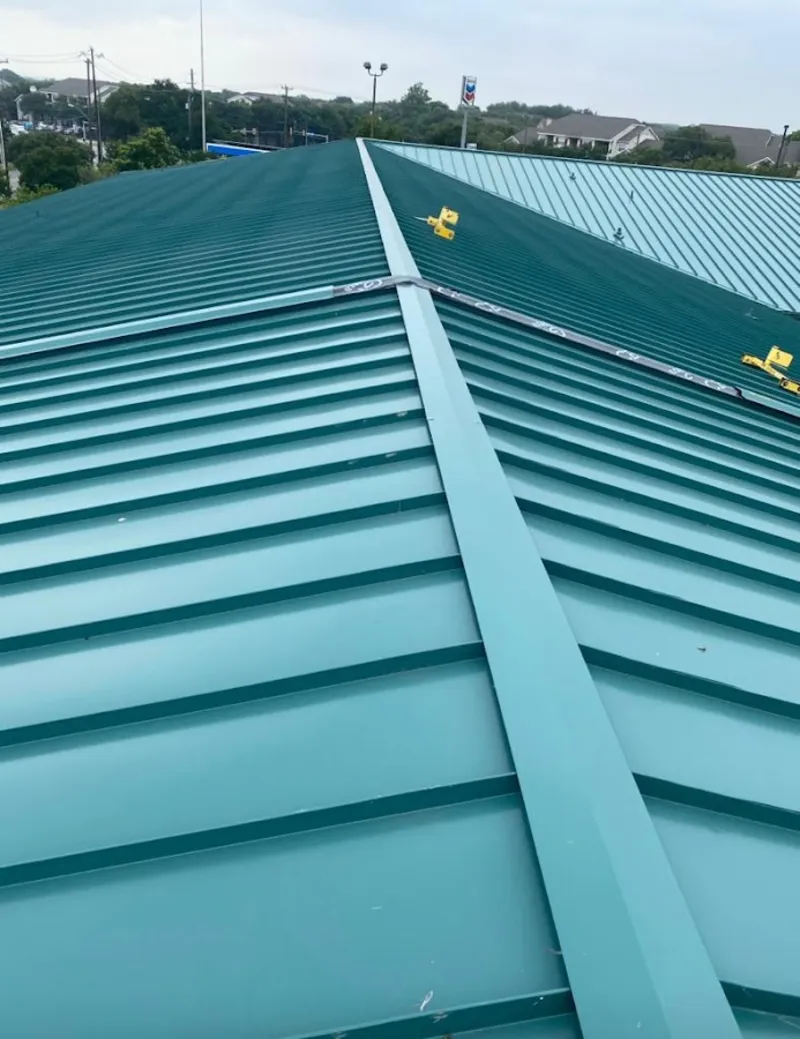 Green commercial metal roof ridge and valley for Metal Roof Repair in Gloversville
